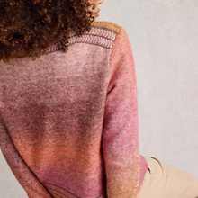 Load image into Gallery viewer, Person wearing a multicolored knit sweater against a plain background
