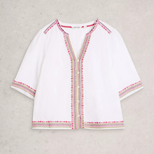 Load image into Gallery viewer, White blouse with colorful embroidery on a light gray background
