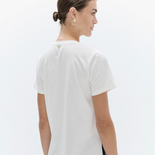 Load image into Gallery viewer, A woman shown from the back wearing a plain white short-sleeve crew-neck T-shirt against a clean white studio background.
