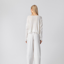 Load image into Gallery viewer, Person wearing a white outfit on a plain background
