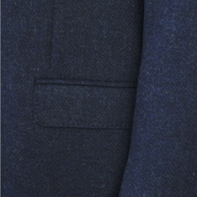 Load image into Gallery viewer, Close-up of a textured navy blue fabric with a pocket detail
