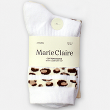 Load image into Gallery viewer, A pair of white cotton socks with a brown and beige leopard print cuff, packaged in a cream-colored paper sleeve labeled 'Marie Claire'.
