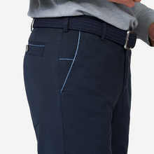 Load image into Gallery viewer, Navy pants with a belt on a white background
