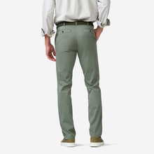 Load image into Gallery viewer, Person wearing light gray pants and a white shirt on a white background

