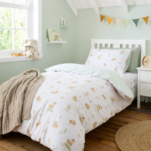Load image into Gallery viewer, Children's bedroom with teddy bear-themed bedding and decor.

