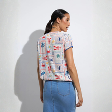 Load image into Gallery viewer, Model in Short Sleeve Top on White background - Rear 
