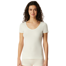 Load image into Gallery viewer, Woman wearing a white t-shirt on a white background
