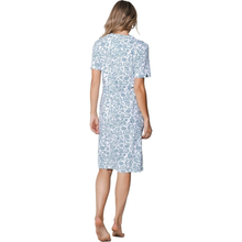 Load image into Gallery viewer, Woman wearing a blue floral dress on a white background
