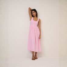 Load image into Gallery viewer, Woman wearing a pink dress against a plain background
