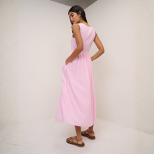 Load image into Gallery viewer, Woman wearing a pink dress against a white background
