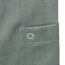 Load image into Gallery viewer, Close-up of a textured fabric pocket with a button on a light gray background
