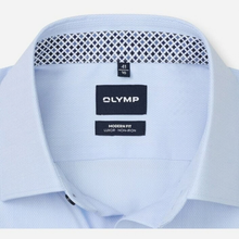 Load image into Gallery viewer, Close-up of the collar of a light blue dress shirt with a visible black and white patterned inner neck band and an OLYMP brand label.
