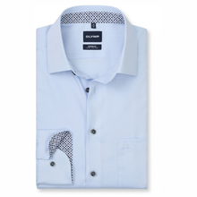 Load image into Gallery viewer, A light blue dress shirt by OLYMP, neatly folded to show the collar, front buttons, chest pocket, and a black-and-white patterned inner placket detail, on a plain white background.
