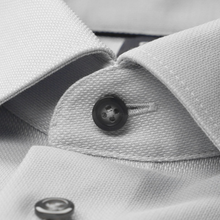 Load image into Gallery viewer, Close-up of a gray shirt with buttons and collar details
