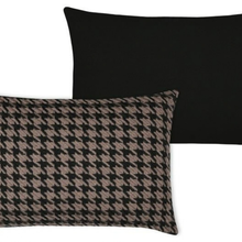 Load image into Gallery viewer, Two decorative throw pillows on a white background: one with a black and beige houndstooth pattern, and one solid black.
