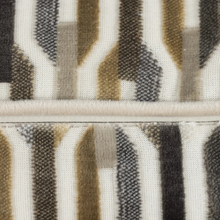 Load image into Gallery viewer, Close-up of a woven textile with a geometric pattern in off-white, beige, brown, and charcoal gray, separated by a horizontal stitched seam.
