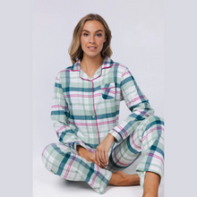 Load image into Gallery viewer, Woman wearing a plaid pajama set on a white background

