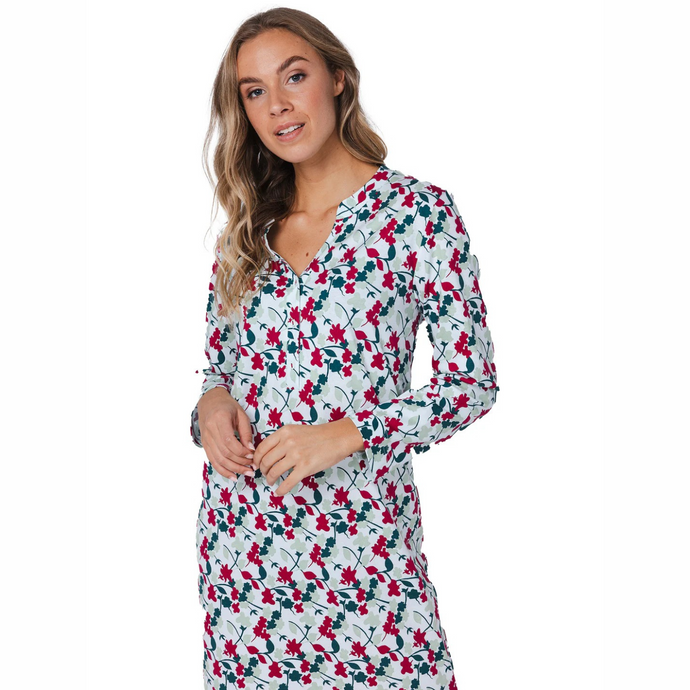 Woman wearing a floral dress on a white background