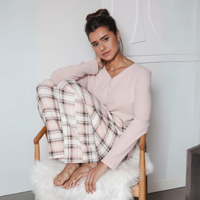 Girl in Pyjama Set sitting on Chair 