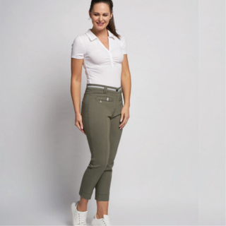 Model posing from a front angle, wearing Pinns Khaki Bengaline Ankle Grazer Trouser 378CT, with a grey to white gradient background.