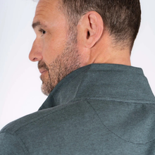 Load image into Gallery viewer, Man wearing a dark green shirt against a white background
