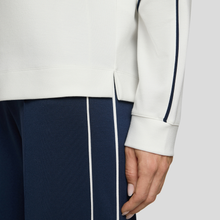 Load image into Gallery viewer, Lower view of Rabe Leisure Wear Top White With Navy, with a grey background.
