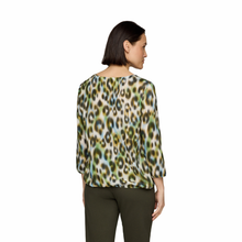 Load image into Gallery viewer, Back view of Model wearing Rabe Animal Print Blouse  in Khaki, with a white background.
