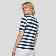 Load image into Gallery viewer, Woman wearing a navy and white striped shirt on a plain background
