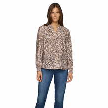 Load image into Gallery viewer, Model wearing Rabe Print V-Neck Top in Grey with a white background.
