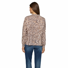 Load image into Gallery viewer, Back view of Model wearing Rabe Print V-Neck Top in Grey with a white background.
