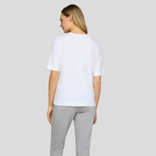 Load image into Gallery viewer, Person wearing a white t-shirt and gray pants on a light gray background
