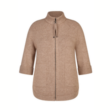 Load image into Gallery viewer, Beige zip-up jacket on a white background
