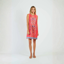 Load image into Gallery viewer, Woman wearing a red dress with floral patterns on a white background
