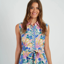 Load image into Gallery viewer, Woman wearing a colorful floral dress on a white background

