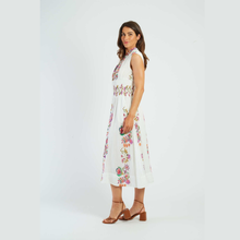 Load image into Gallery viewer, Woman wearing a white dress with floral embroidery on a white background
