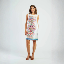 Load image into Gallery viewer, Woman wearing a floral dress on a white background
