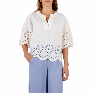 Model wearing Rino & Pelle Wide Blouse in Snow White with a white background