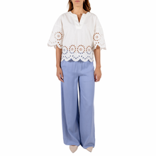 Load image into Gallery viewer, Full view of Model wearing Rino &amp; Pelle Wide Blouse in Snow White with a white background
