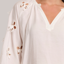 Load image into Gallery viewer, Close up of Rino &amp; Pelle Long Balloon Sleeve Blouse, With a grey background.
