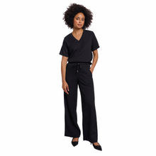 Load image into Gallery viewer, Full view of model wearing Rino &amp; Pelle Wide Leg Pants in Black
