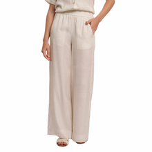 Load image into Gallery viewer, View of the Rino &amp; Pelle Wide Leg Pants in the colour Snow White
