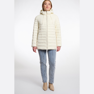 Woman wearing a cream puffer jacket on a white background