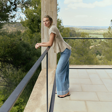 Load image into Gallery viewer, Model wearing jean with mesh top on balcony in forest 
