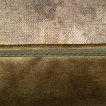 Load image into Gallery viewer, Close up of the side of the Dromore cushion showing the zip and the two tone natural and natural green colour
