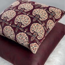 Load image into Gallery viewer, A promo shot of the Persia Aubergine cushion on top of another aubergine cushion
