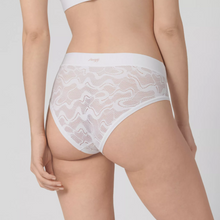 Load image into Gallery viewer, A model showing the back details of the Sloggi Go All Round Lace midi brief in white. 
