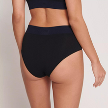 Load image into Gallery viewer, A model showing the back of the Sloggi Ever Infused Aloe High Waist Brief in Black. 
