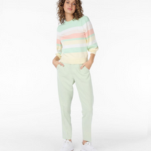 Load image into Gallery viewer, female  model wearing esqualo striped sweater in pistachio colour with hands in pockets
