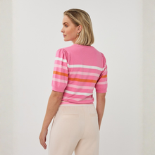 Load image into Gallery viewer, Woman wearing a pink striped shirt with puff sleeves on a plain background
