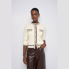 Load image into Gallery viewer, Cardigan cream with brown trim teamed with brown trousers 
